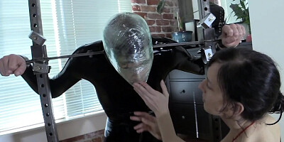 Elise Graves puts on a strap-on and throat-fucks a gimp