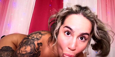 Inked blonde flirts with the camera while blowing and fucking