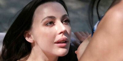 Two astonishing brunettes making out by the swimming pool