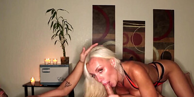 Slutty blonde masseuse working overtime on his boner