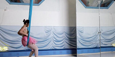 Skinny and flexible angel Sara Heat is touching her shaved pussy