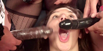 Girl becomes a participant of group sex with strapons usage