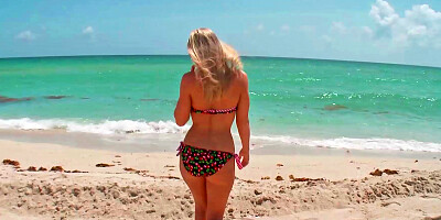 Curvy blonde is having a sexy time by the beach