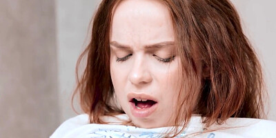 Petite redhead Luna Haze teasing her clit while sittign