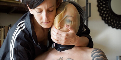 Tied up girl is tormented by a depraved lesbian dominatrix