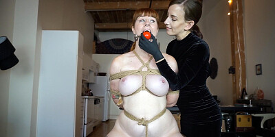Barbary Rose is tied and tortured with a sack on her head