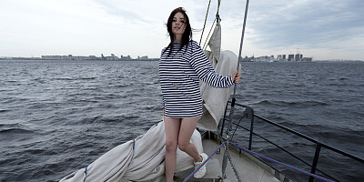 Amazing babe masturbates in a boat on an open ocean