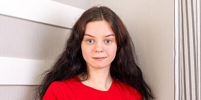 Sensual teen with an adorable face shows you her body