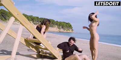Beach Threesome: One Takes It Doggy While the Other Watches