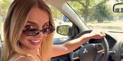 Blonde driver performs oral act in parked car