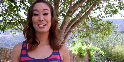Asian-American cougar gets naked and fingers her snatch