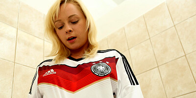 Naomi Nevena takes off her jersey and masturbates her hole
