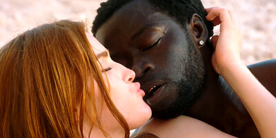 Beach fucking for a gorgeous redhead and a black hunk