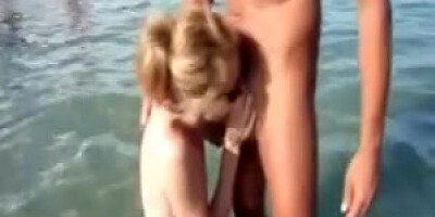 Public deep throat on naked beach part1
