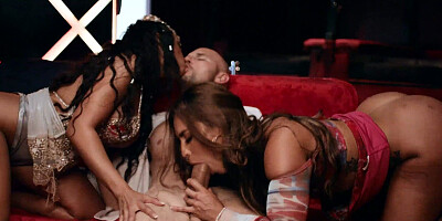 Two smoking hot babes are sharing lucky fellow's cock