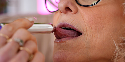 Blonde GILF with stockings and glasses takes a BBC after a dildo