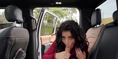 Brunette hottie loves to suck a big pecker in the car