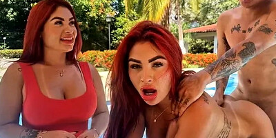 Resort waiter and guest share outdoor encounter