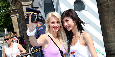 Sara Coul and Monika H fool around in the city and fuck outside