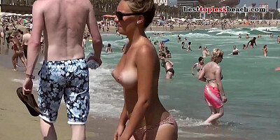 Gorgeous boobs Topless on the Beach