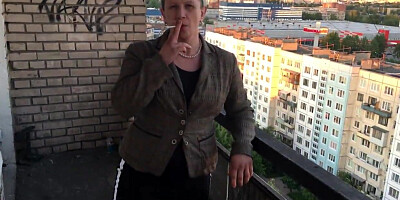 Mature Russian whore shows off butt and twat outdoors