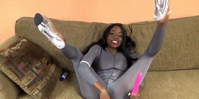 Posh Ebony in catsuit uses pink dildo to fuck herself