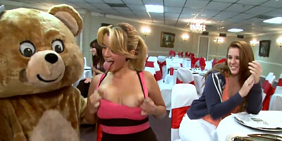 Male strippers with hard cocks dance naked around MILFs