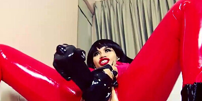 Horny brunette wearing latex while fucking a huge toy