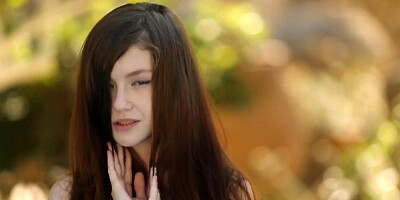 Brunette Emily Bloom shows off her luscious body