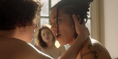 Bunny Harper and Puck Ellington in a romantic dyke scene