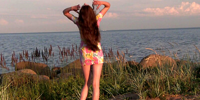 Cutie Nicole naked on the lake shore