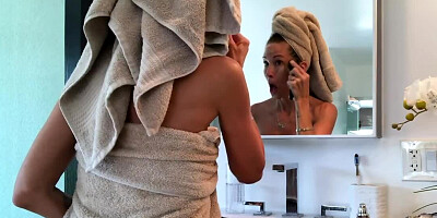 Blonde cougar in sexy lingerie loves playing with sex toys