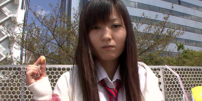 Japanese schoolgirl Ryo Asaka caresses herself in the shower