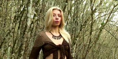 Cute blonde solo in the forest