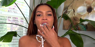 Ebony Ashlyn Peaks caresses her big natural tits