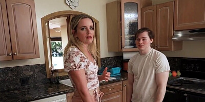 A blonde MILF is taking care of two dicks at once