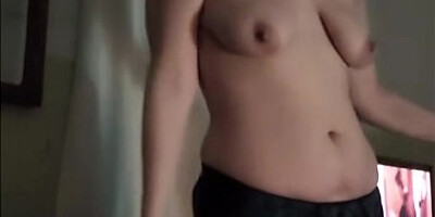 Quick striptease—her clothes hit the floor as her body begs for touch
