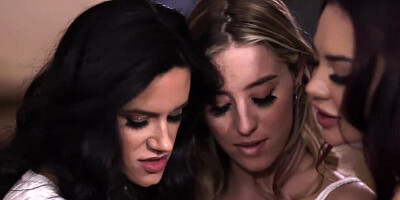 Three dykes with banging figures having a threesome