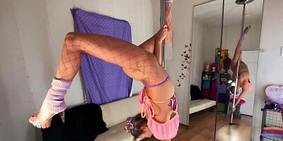 Fun on the pole makes attractive nymph eager to suck dildo