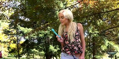 Shameless petite blonde is playing with herself outdoors