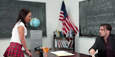 A hot chick makes a move on her teacher in the classroom