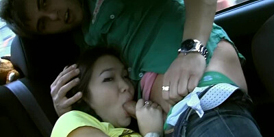 Alluring Asian chick fools aournd with her boyfriend in the car