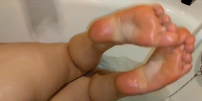 Close-up foot show in the bathroom