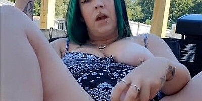 Vibrant squirting with a dildo on the porch