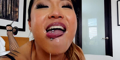 A petite Asian pornstar opens up her mouth and she sucks a cock