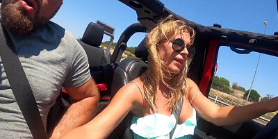 Big-chested Platinum-blonde COUGAR Gives Road Head While Driving