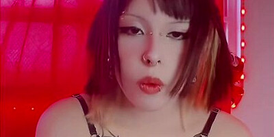 Dark-haired beauty smoking and squeezing tight