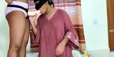 Masked Indian double penetrated by a cock and a strap-on