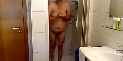 German PLUMPER COUGAR 53 with inborn boobies & sensitive tummy takes a douche