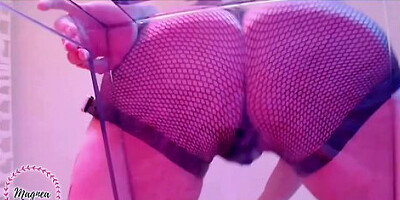 Dominant beauty dancing on a transparent throne of desire